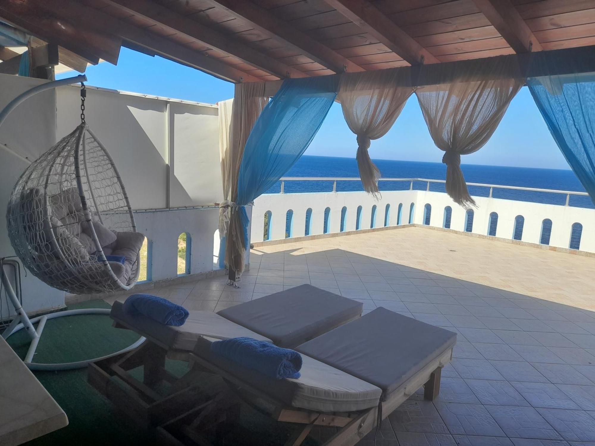 Delfini Aparthotel Akhladherí Buitenkant foto