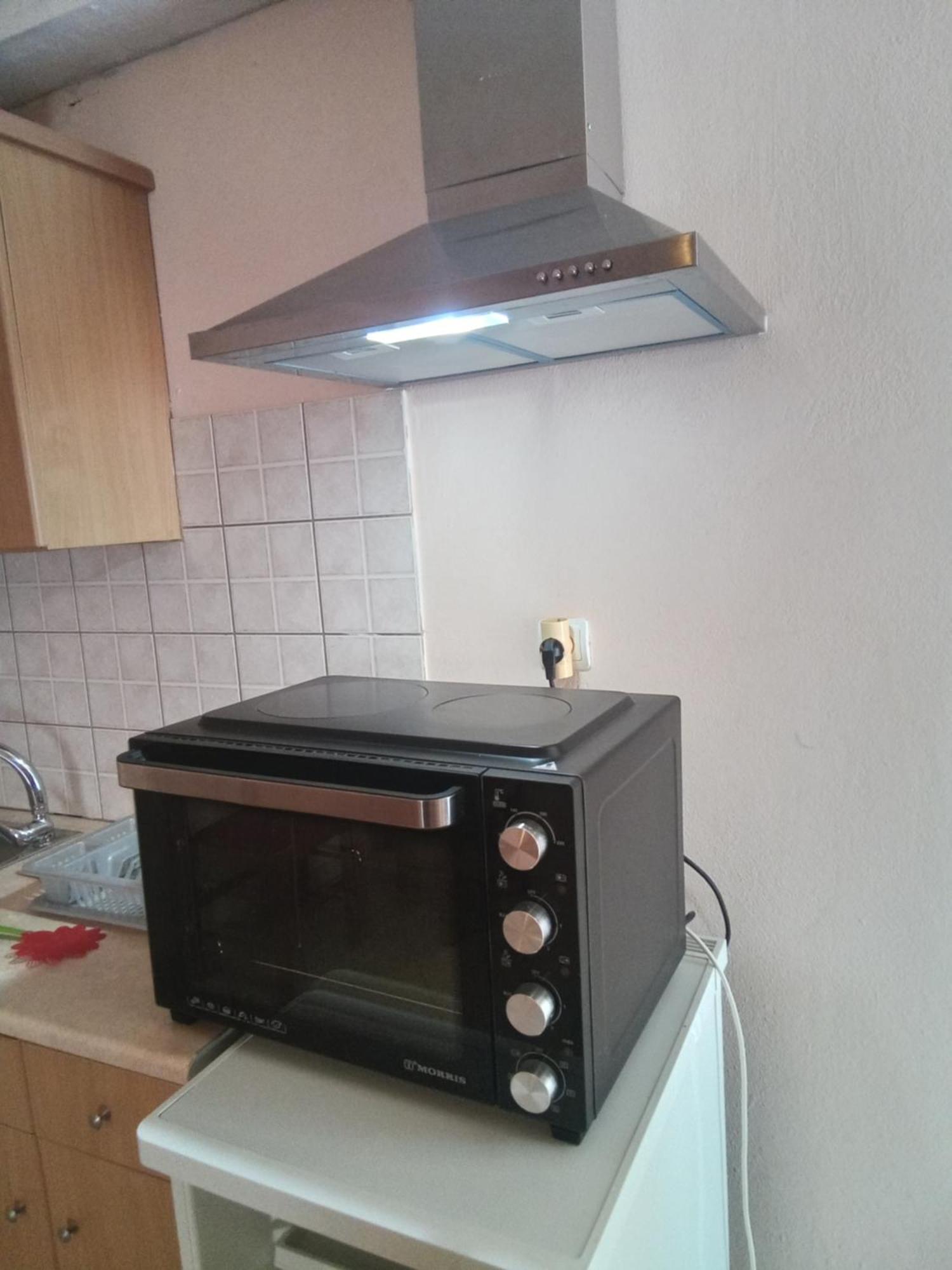 Delfini Aparthotel Akhladherí Buitenkant foto
